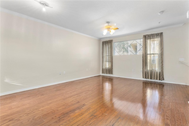 1825 Shadow View Cir Unit 1825, Maitland, FL 32751 - unfurnished room featuring a ceiling fan, hardwood / wood-style flooring, and crown molding