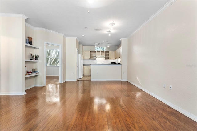 1825 Shadow View Cir Unit 1825, Maitland, FL 32751 - unfurnished living room with light wood-style floors and crown molding