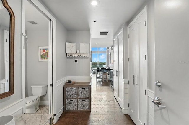 150 E Robinson St Unit 407, Orlando, FL 32801 - hallway with wood finished floors and recessed lighting