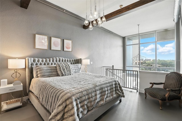150 E Robinson St Unit 407, Orlando, FL 32801 - bedroom with a textured wall and beamed ceiling