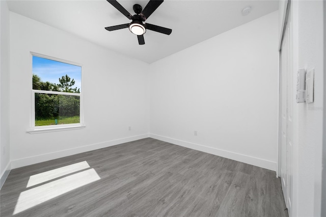 3270 Framinghan Ave SW, Palm Bay, FL 32908 - unfurnished room featuring wood finished floors, a ceiling fan, and a smoke detector