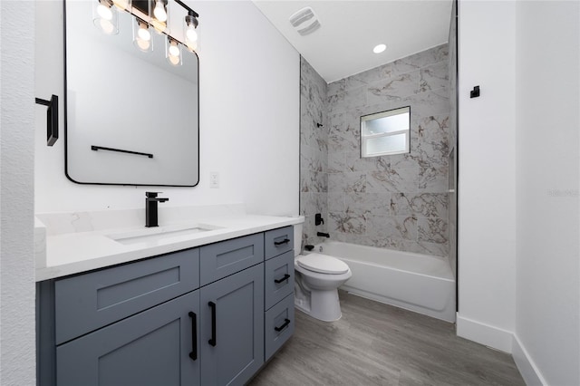 3270 Framinghan Ave SW, Palm Bay, FL 32908 - full bathroom featuring vanity, wood finished floors, and bathtub / shower combination