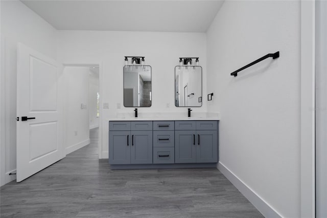3270 Framinghan Ave SW, Palm Bay, FL 32908 - full bathroom featuring double vanity and wood finished floors