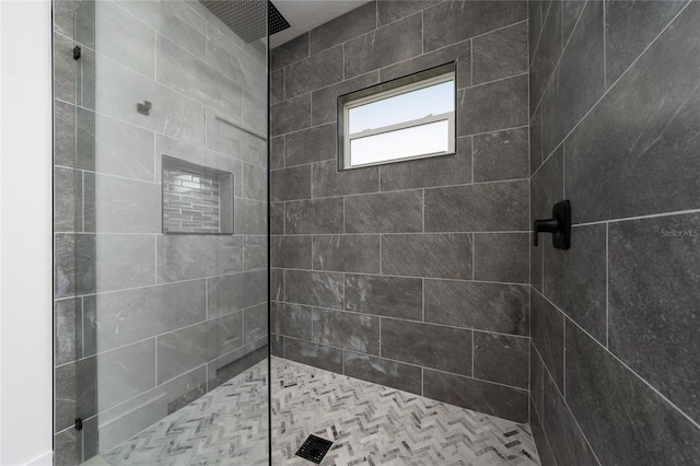 3270 Framinghan Ave SW, Palm Bay, FL 32908 - bathroom featuring a tile shower