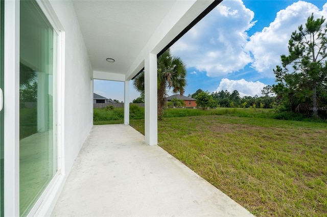 3270 Framinghan Ave SW, Palm Bay, FL 32908 - view of green lawn featuring a patio