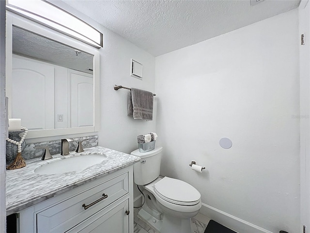 400 E Colonial Dr Unit 1501, Orlando, FL 32803 - bathroom featuring vanity, a textured ceiling, and marble finish floors