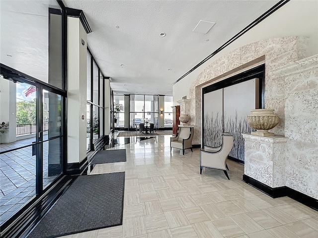 400 E Colonial Dr Unit 1501, Orlando, FL 32803 - common area with expansive windows and a textured ceiling