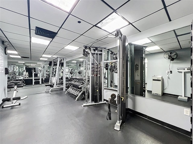 400 E Colonial Dr Unit 1501, Orlando, FL 32803 - workout area featuring a drop ceiling and baseboards