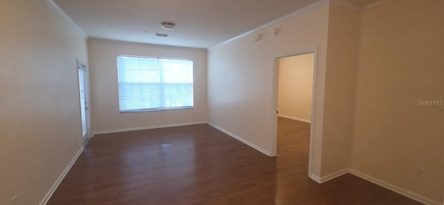 13584 Turtle Marsh Loop Unit 12, Orlando, FL 32837 - unfurnished room with dark wood-style flooring and crown molding
