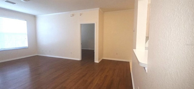 13584 Turtle Marsh Loop Unit 12, Orlando, FL 32837 - empty room featuring dark wood-style floors and crown molding