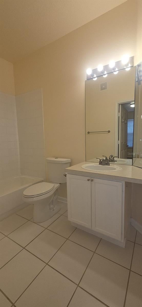 13584 Turtle Marsh Loop Unit 12, Orlando, FL 32837 - bathroom with tile patterned floors and vanity
