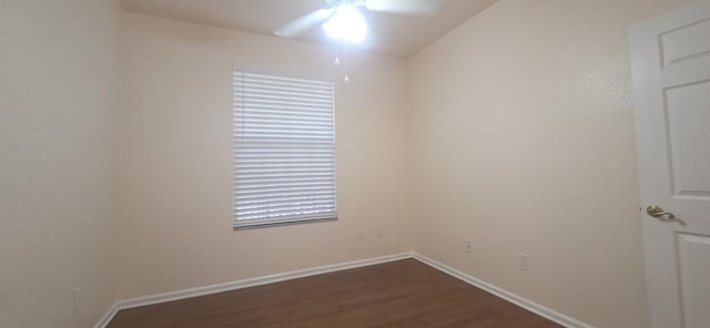 13584 Turtle Marsh Loop Unit 12, Orlando, FL 32837 - spare room with ceiling fan and dark wood-style flooring