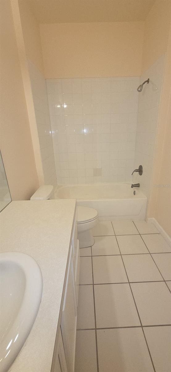 13584 Turtle Marsh Loop Unit 12, Orlando, FL 32837 - bathroom with tile patterned flooring, vanity, and bathing tub / shower combination