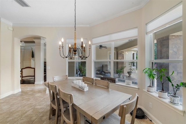 25554 Hawks Run Ln, Sorrento, FL 32776 - dining room with arched walkways, ornamental molding, a chandelier, decorative columns, and light tile patterned flooring