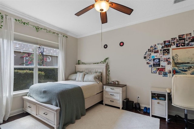 25554 Hawks Run Ln, Sorrento, FL 32776 - bedroom with crown molding, wood finished floors, and a ceiling fan