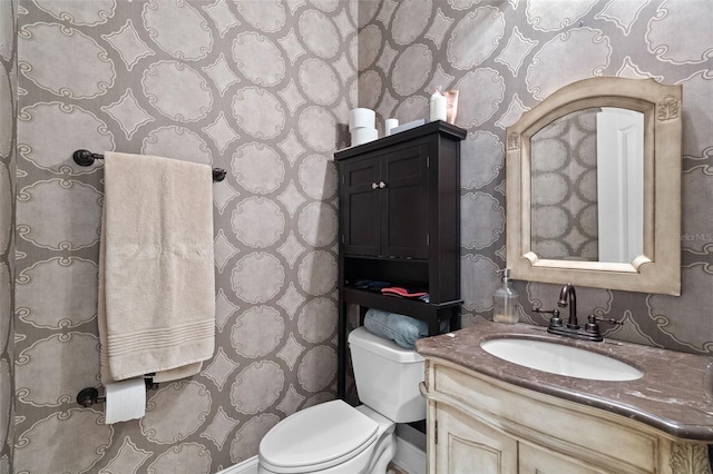 25554 Hawks Run Ln, Sorrento, FL 32776 - bathroom featuring wallpapered walls and vanity