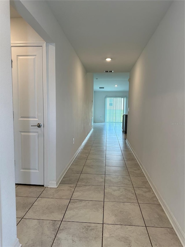 1950 Birnham Wood Bnd, Kissimmee, FL 34746 - hall featuring light tile patterned flooring and recessed lighting