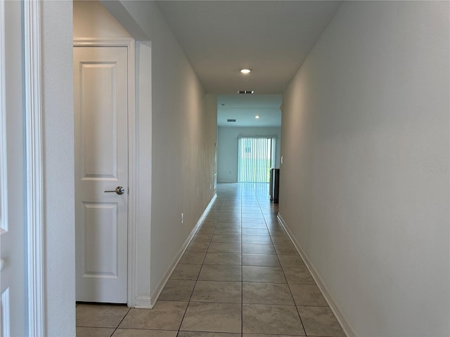 1950 Birnham Wood Bnd, Kissimmee, FL 34746 - hallway featuring light tile patterned floors and recessed lighting