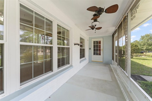 2538 Meadowview Ln, Deland, FL 32720 - unfurnished sunroom featuring a ceiling fan and finished concrete floors
