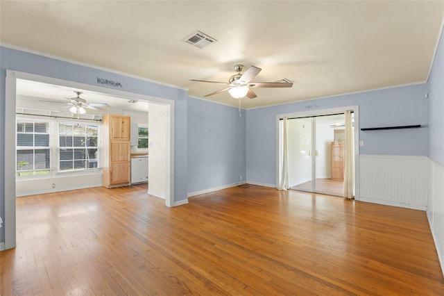 2538 Meadowview Ln, Deland, FL 32720 - spare room featuring ceiling fan, crown molding, and light wood-type flooring