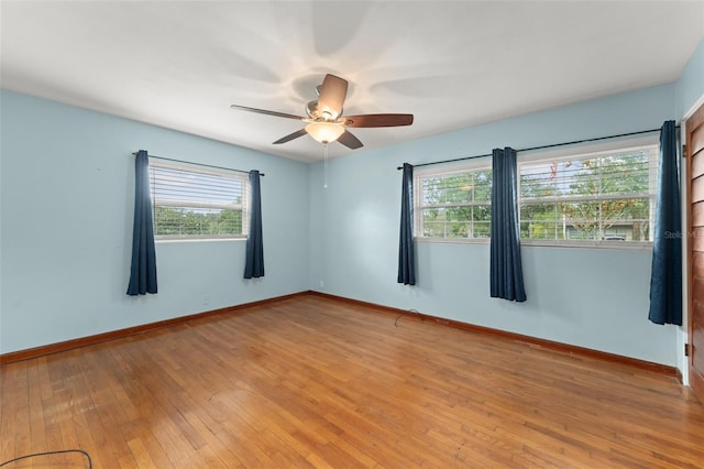 2538 Meadowview Ln, Deland, FL 32720 - empty room with healthy amount of natural light, a ceiling fan, and light wood-type flooring
