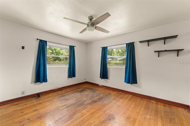 2538 Meadowview Ln, Deland, FL 32720 - unfurnished room featuring a ceiling fan and wood-type flooring