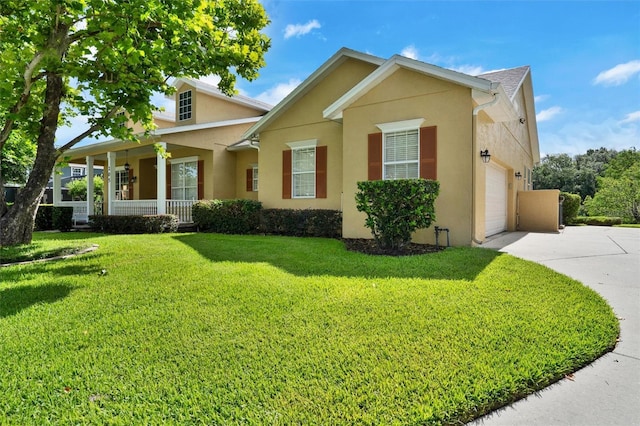 205 Trail Bridge Ct, Winter Garden, FL 34787 - view of front facade with concrete driveway, stucco siding, a front lawn, a porch, and an attached garage