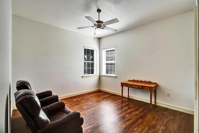 205 Trail Bridge Ct, Winter Garden, FL 34787 - living area with wood finished floors, a ceiling fan, and a textured ceiling