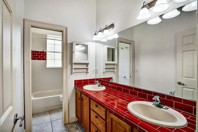 205 Trail Bridge Ct, Winter Garden, FL 34787 - bathroom featuring double vanity, bathtub / shower combination, and tile patterned floors