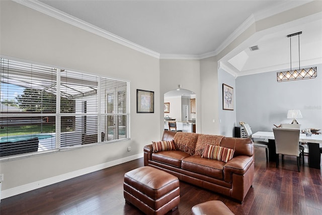 3711 Half Moon Dr, Orlando, FL 32812 - living room featuring arched walkways, ornamental molding, and wood-type flooring