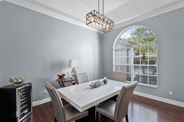3711 Half Moon Dr, Orlando, FL 32812 - dining space with a chandelier, ornamental molding, beverage cooler, and dark wood-style floors