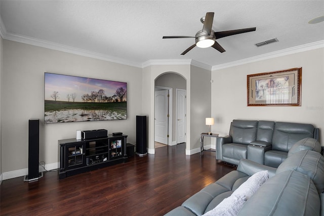 3711 Half Moon Dr, Orlando, FL 32812 - living room with wood finished floors, a ceiling fan, crown molding, and arched walkways