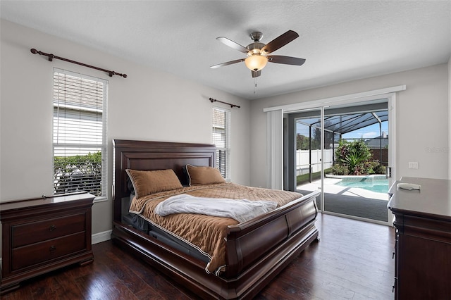 3711 Half Moon Dr, Orlando, FL 32812 - bedroom featuring access to exterior, multiple windows, and dark wood-style floors