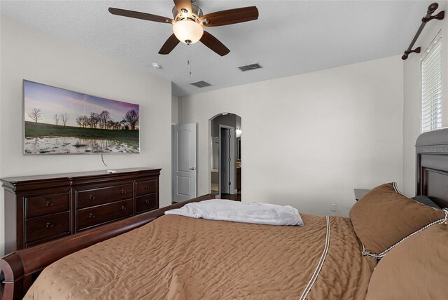 3711 Half Moon Dr, Orlando, FL 32812 - bedroom featuring arched walkways and a ceiling fan