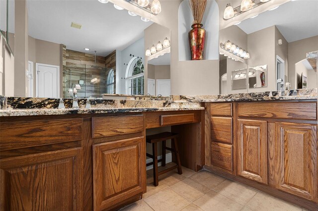 3711 Half Moon Dr, Orlando, FL 32812 - full bathroom featuring a stall shower, two vanities, and tile patterned floors