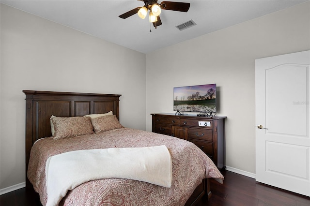 3711 Half Moon Dr, Orlando, FL 32812 - bedroom with dark wood-style floors and ceiling fan