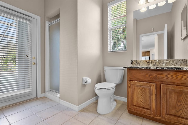 3711 Half Moon Dr, Orlando, FL 32812 - bathroom featuring vanity, plenty of natural light, a stall shower, and tile patterned flooring
