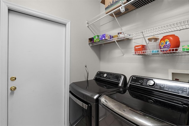 3711 Half Moon Dr, Orlando, FL 32812 - laundry room with washing machine and dryer