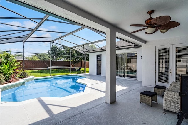 3711 Half Moon Dr, Orlando, FL 32812 - view of swimming pool featuring a patio, a ceiling fan, and glass enclosure