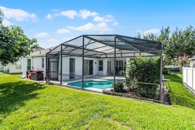 3711 Half Moon Dr, Orlando, FL 32812 - back of house featuring a patio, a lawn, an outdoor pool, and a lanai