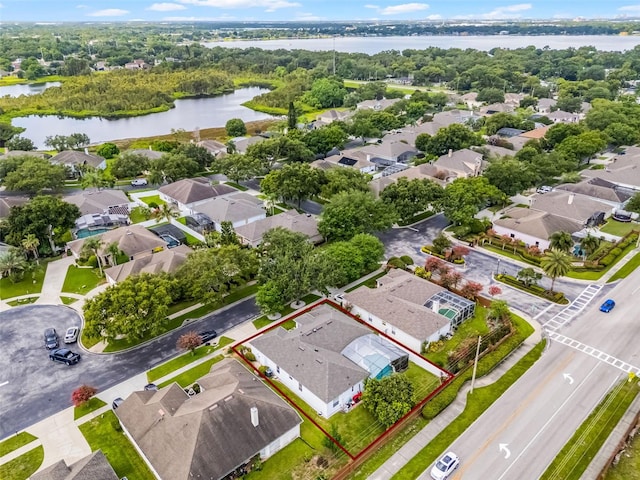 3711 Half Moon Dr, Orlando, FL 32812 - aerial view of residential area featuring a large body of water and property parcel outlined
