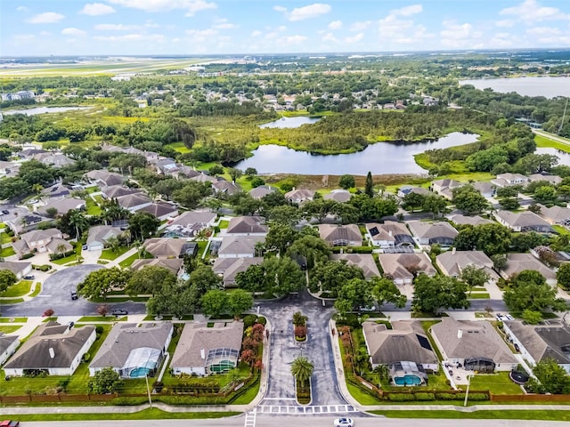 3711 Half Moon Dr, Orlando, FL 32812 - aerial view of property and surrounding area with a large body of water and nearby suburban area