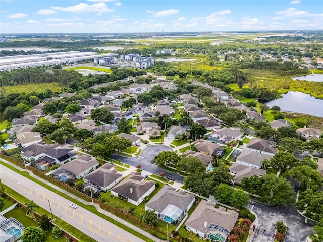 3711 Half Moon Dr, Orlando, FL 32812 - aerial view of property's location featuring a nearby body of water and nearby suburban area