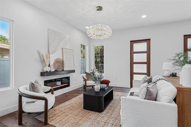 1780 Mizell Ave, Winter Park, FL 32789 - living room with a chandelier, a glass covered fireplace, wood finished floors, and recessed lighting