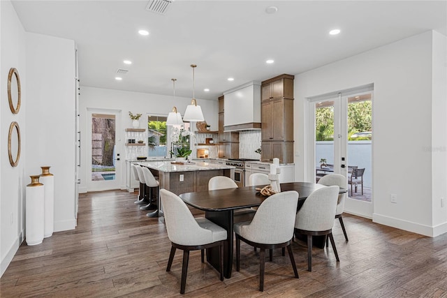 1780 Mizell Ave, Winter Park, FL 32789 - dining space with plenty of natural light, french doors, recessed lighting, and dark wood-style floors