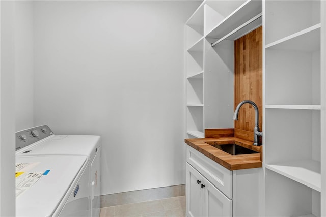 1780 Mizell Ave, Winter Park, FL 32789 - laundry room with washing machine and clothes dryer, cabinet space, light tile patterned floors, and wet bar