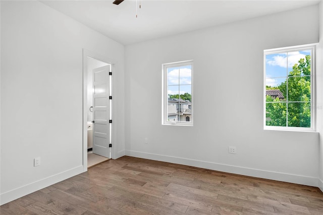 1780 Mizell Ave, Winter Park, FL 32789 - empty room with wood finished floors and a ceiling fan