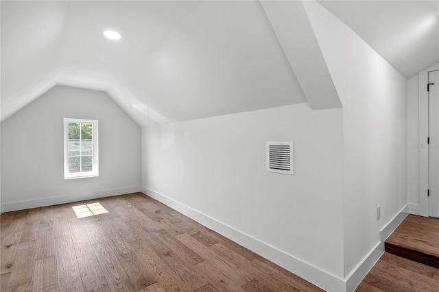 1780 Mizell Ave, Winter Park, FL 32789 - additional living space featuring lofted ceiling and wood finished floors