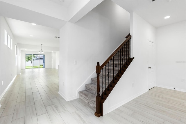 12216 Encore At Ovation Way, Winter Garden, FL 34787 - stairs with wood finished floors and recessed lighting