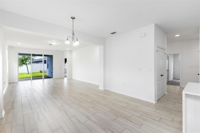 12216 Encore At Ovation Way, Winter Garden, FL 34787 - spare room with light wood-style flooring, a chandelier, and recessed lighting